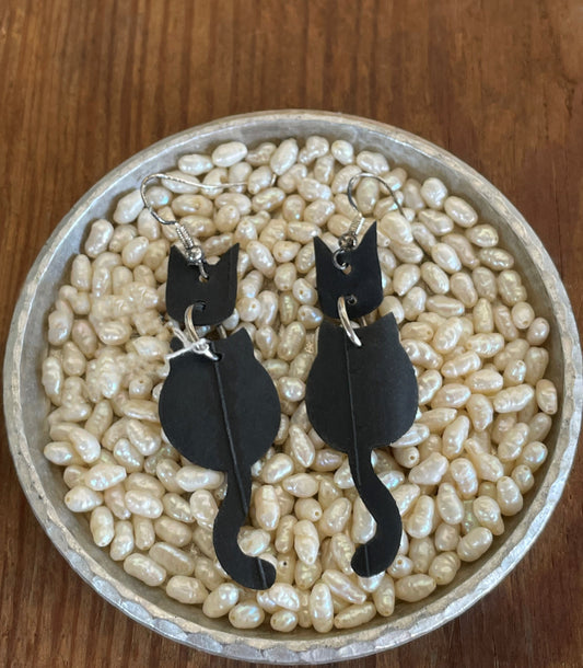 Black cat dangle earrings made from bicycle inner tubes